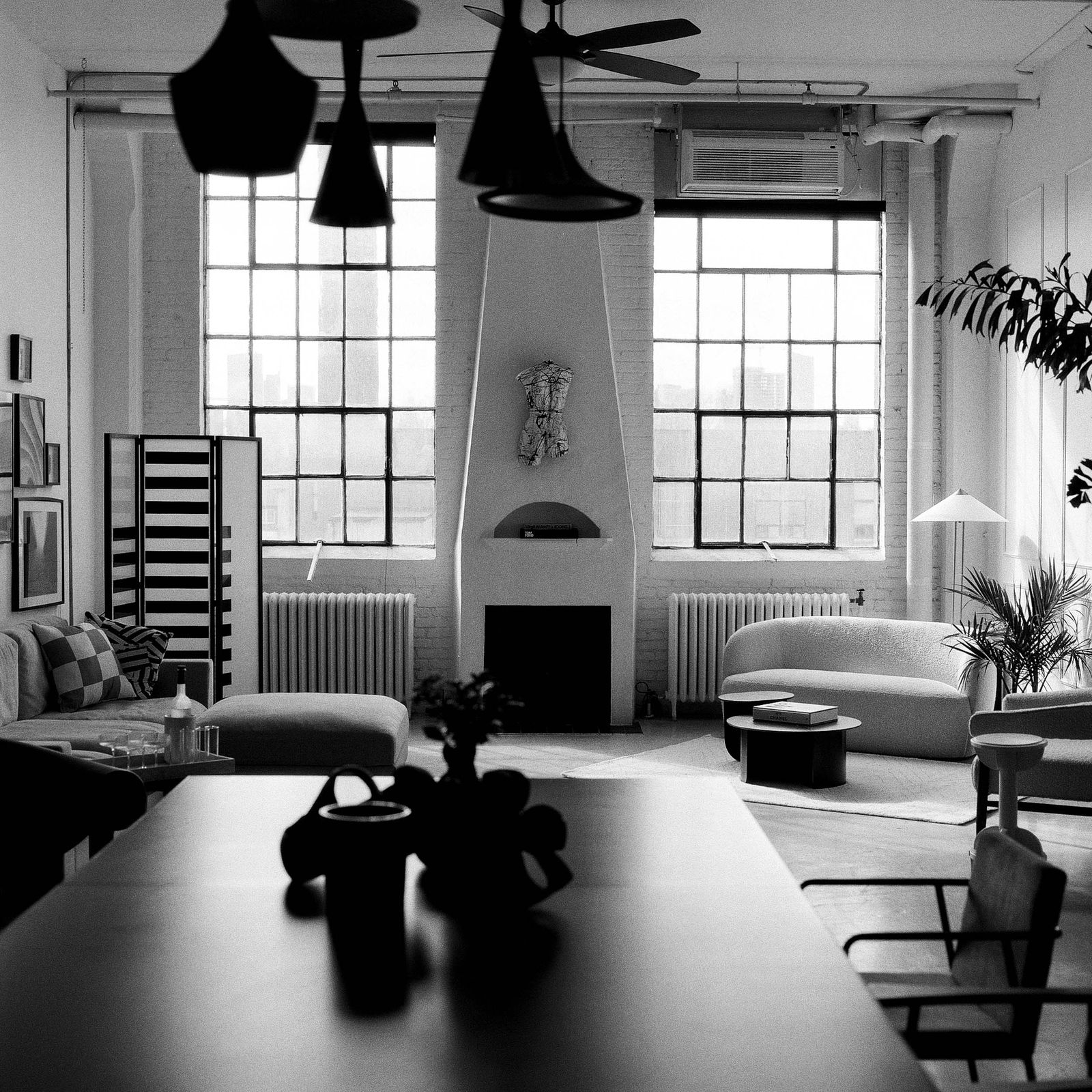 Bright loft-style production studio in Toronto with tall industrial windows